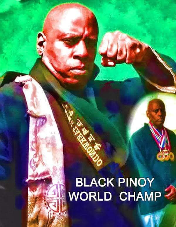 Black Pinoy Joel Crafton in martial arts uniform, master of the martial arts and champion with over 400 gold medals.