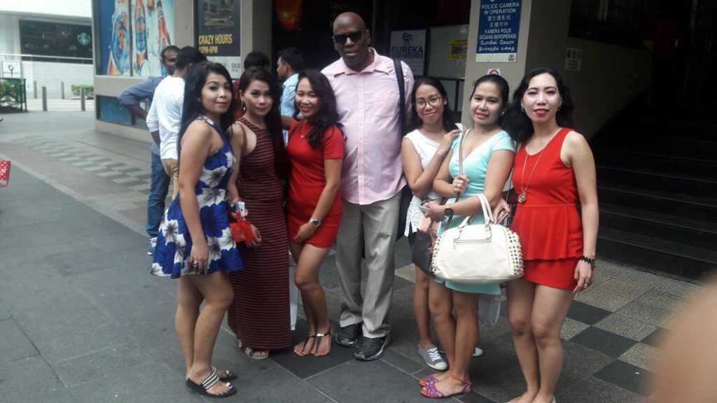 Black Pinoy multimedia artist Joel Crafton interacting with supporters and fans